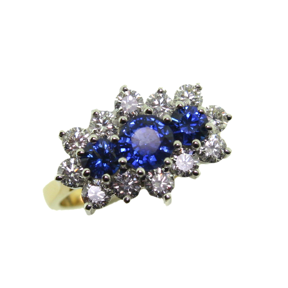 Sapphire and diamond triple cluster ring, 1.17cts 18ct gold mount