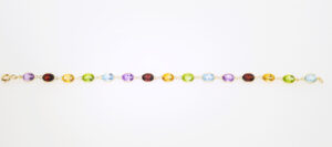 SP:B525P-Y Multi gem and 18ct gold bracelet long