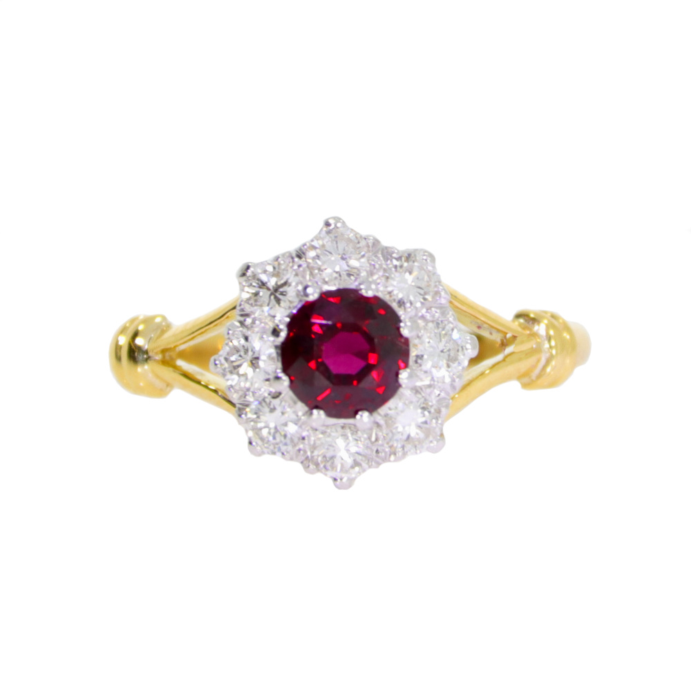 Ruby and diamond nine stone cluster ring, platinum and 18ct yellow gold mount