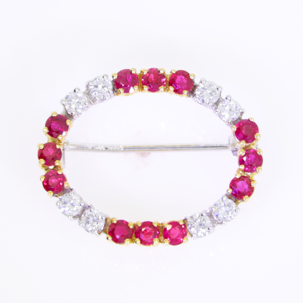 Ruby and diamond oval brooch, 18ct white and yellow gold mount