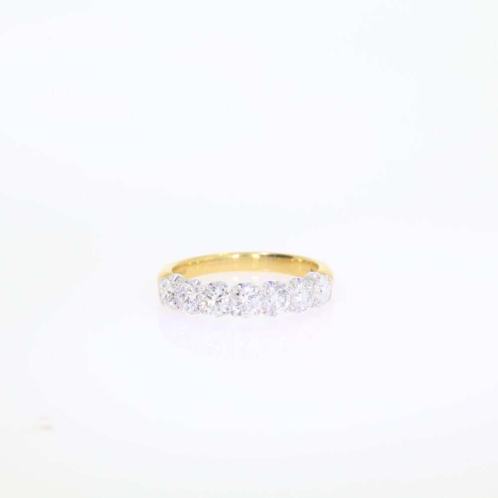 Diamond seven stone half eternity ring 1.23cts, platinum settings and 18ct yellow gold shank