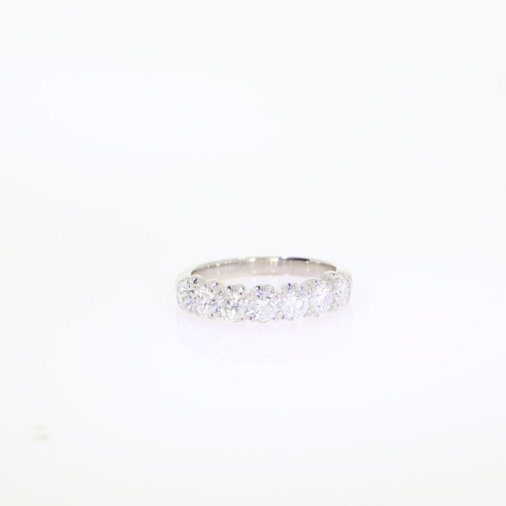 Diamond seven stone half eternity ring 1.29cts, platinum settings and shank