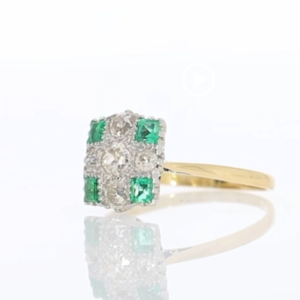 Emerald and diamond inverted cluster ring, platinum and 18ct yellow gold mount video