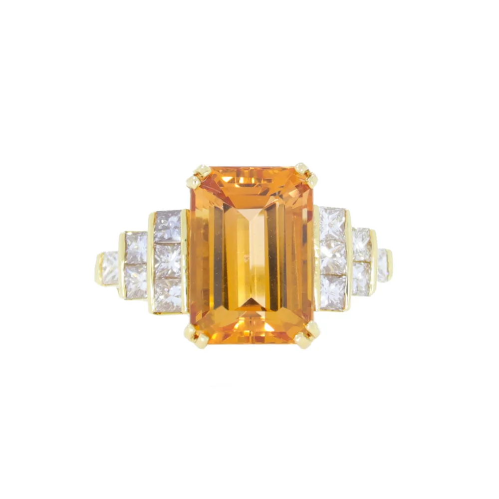 Topaz single stone ring with diamond step shoulders, 18ct yellow gold mount