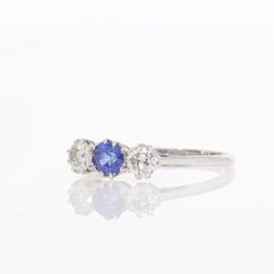 Sapphire and diamond three stone ring, platinum and 18ct white gold mount video