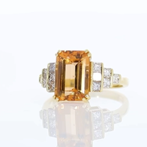 Topaz single stone ring with diamond step shoulders, 18ct yellow gold mount video