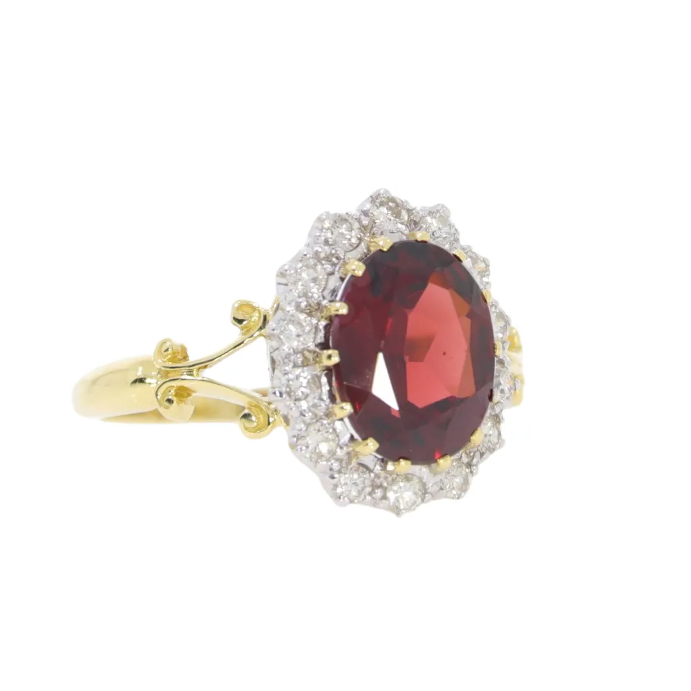 Garnet and diamond cluster ring, 18ct yellow gold mount