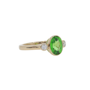 Z169.4 Tsavorite and diamond 3 stone ring side