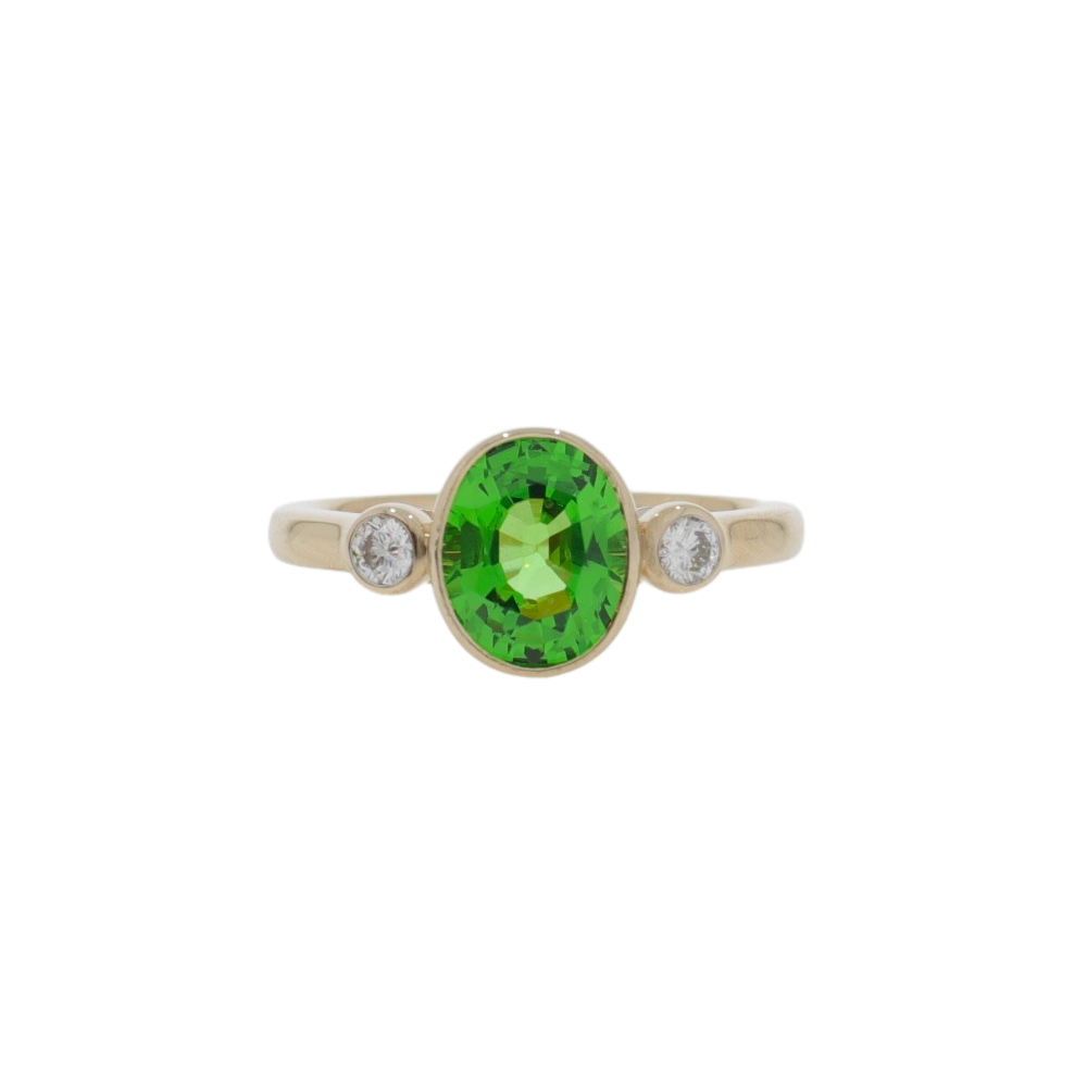 Tsavorite garnet and diamond three stone ring, 18ct rose gold mount