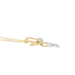 Q267.5 Diamond and 18ct gold pendant side