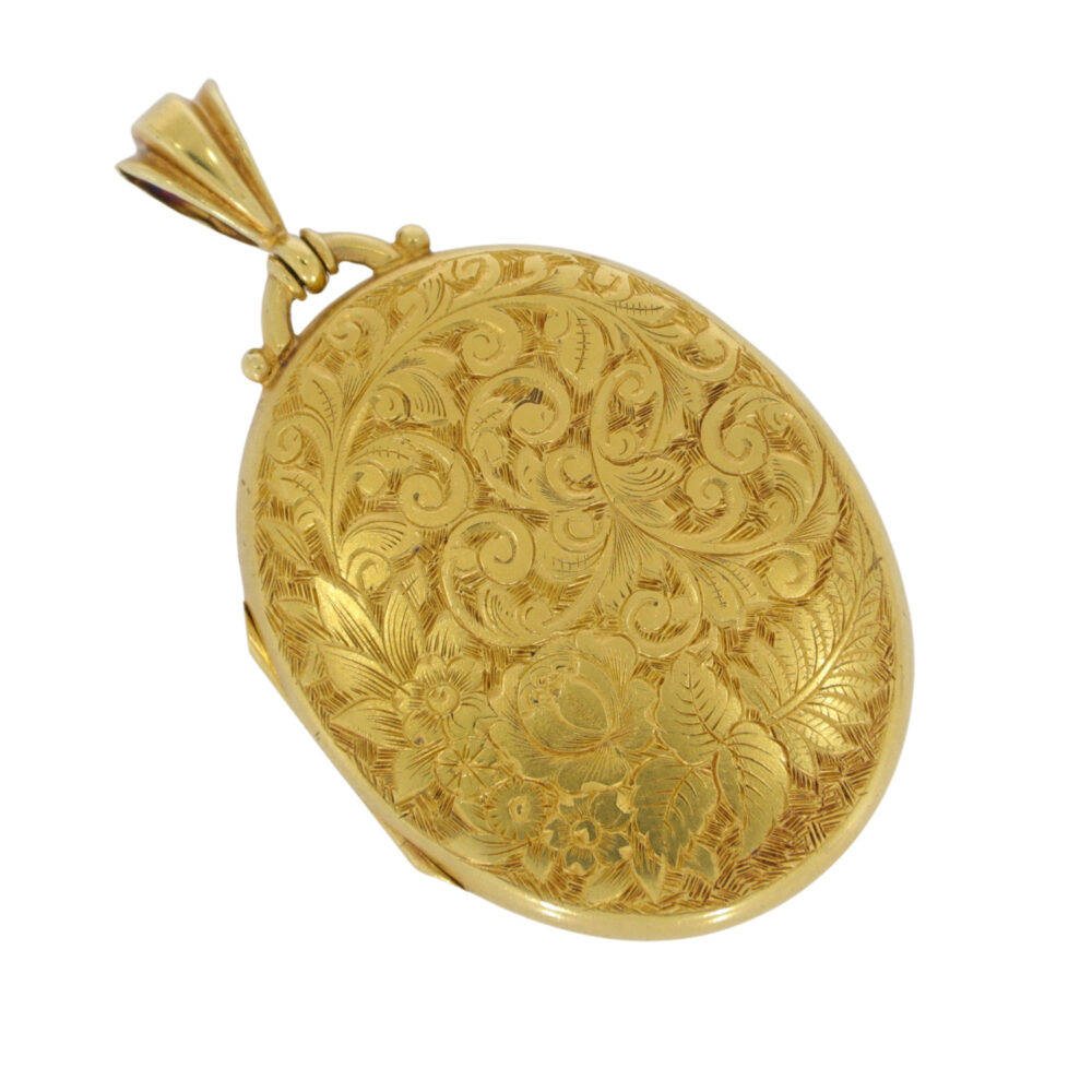 15ct gold oval hand engraved floral locket Circa 1890s