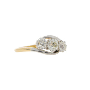 G38.4 Diamond three stone crossover ring side