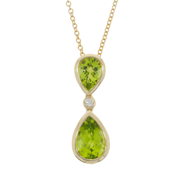Peridot pendeloque and diamond drop pendant, 9ct gold mount and necklet