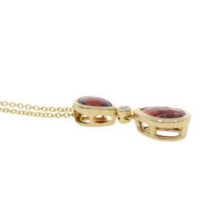 S270.5 Garnet and diamond drop pendant side