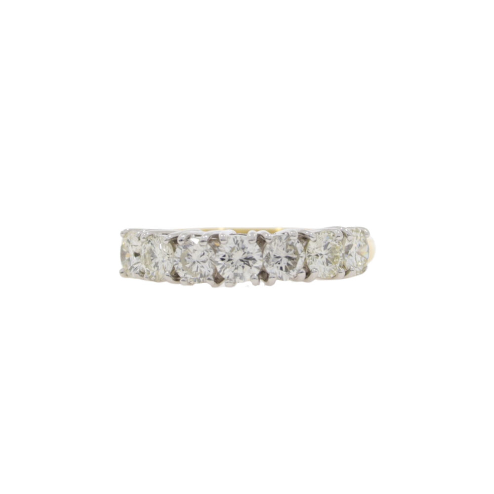 Diamond seven stone half eternity ring, 18ct gold mount