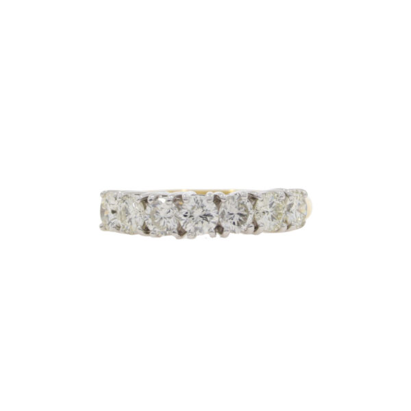 Diamond seven stone half eternity ring, 18ct gold mount