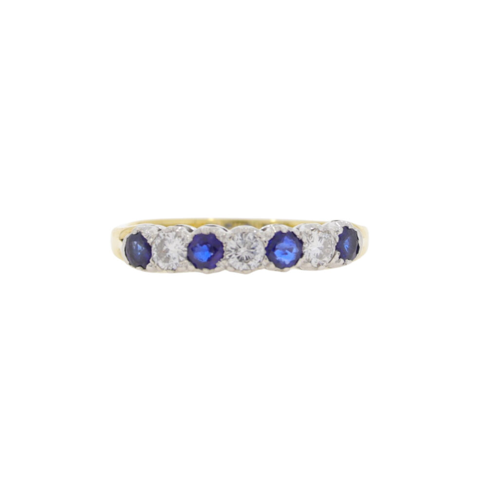 Sapphire and diamond seven stone half eternity ring, 18ct gold mount
