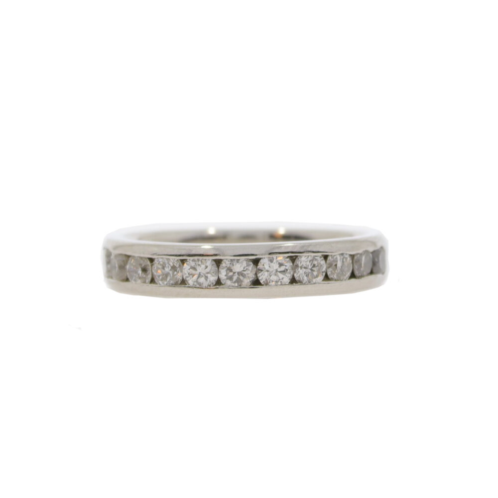 Diamond eleven stone channel set half eternity ring, platinum mount
