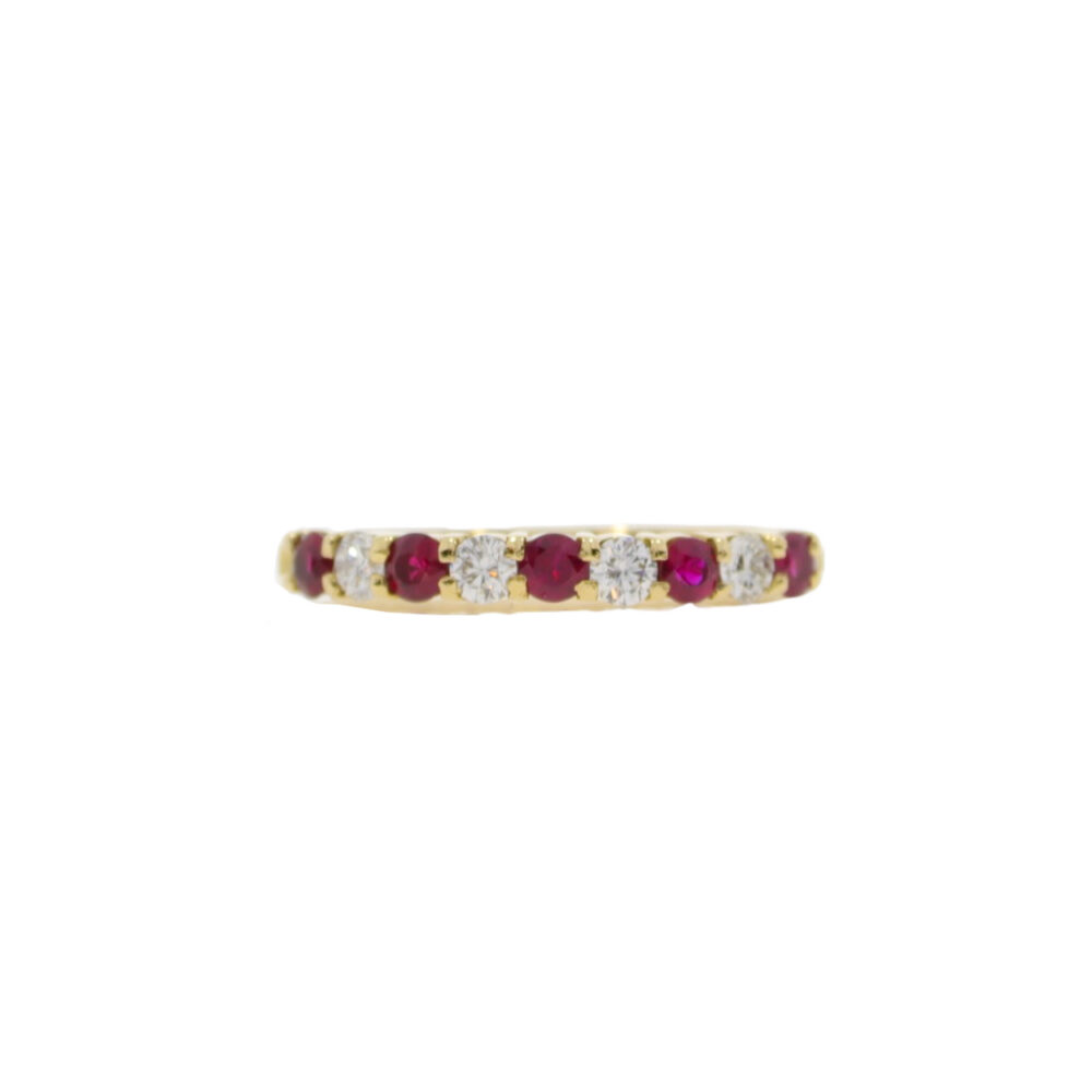 Ruby and diamond nine stone half eternity ring, 18ct gold mount
