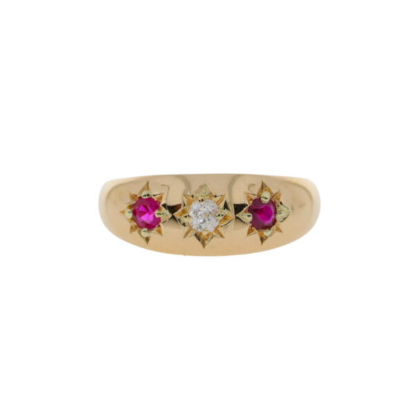 Ruby and diamond three stone star set ring, 18ct yellow gold mount