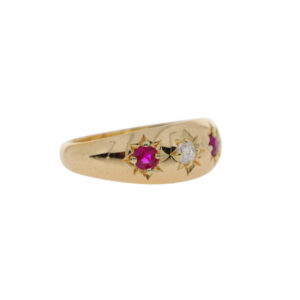 D135.4 Ruby and diamond three stone star set ring side