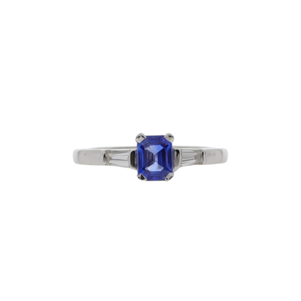 Sapphire emerald cut single stone ring, with baguette cut diamond shoulders, 18ct white gold mount