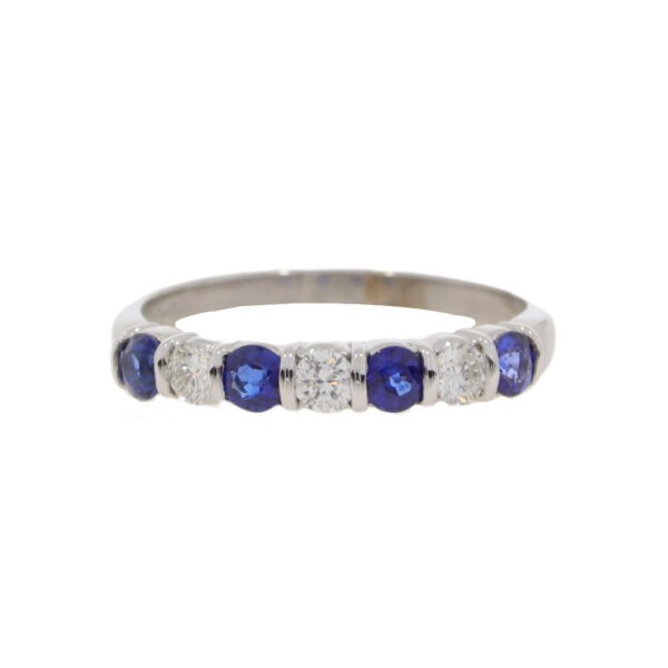 Sapphire and diamond seven stone half eternity bar set ring, 18ct white gold mount