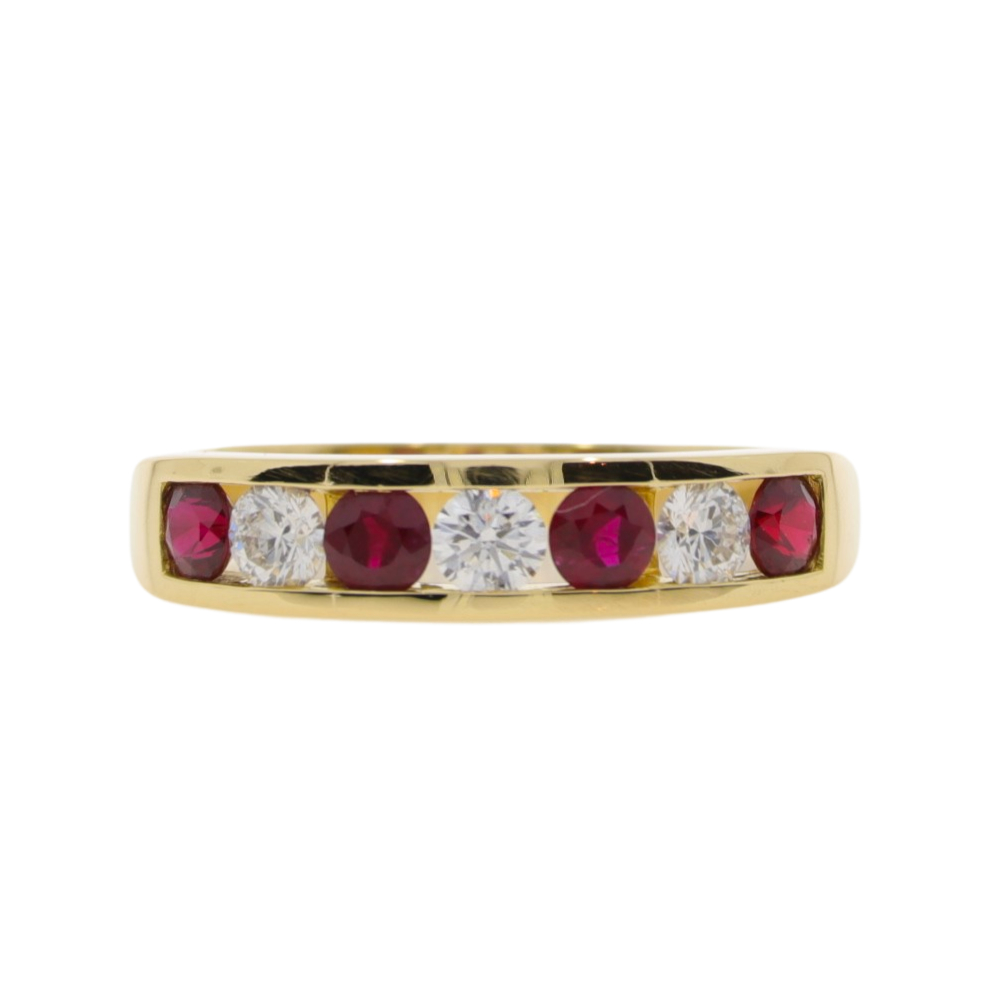 Ruby and diamond seven stone half eternity ring, 18ct gold channel set mount
