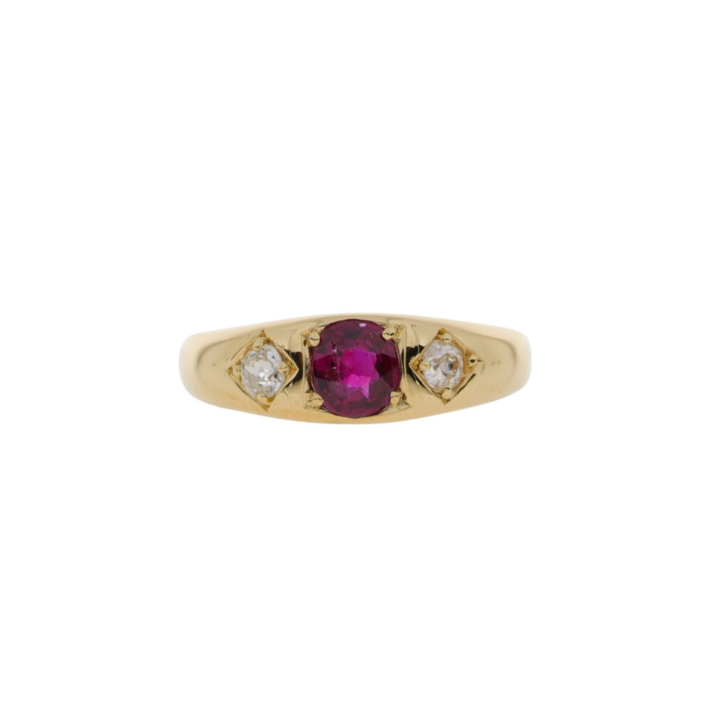 Ruby and diamond three stone ring, 18ct yellow gold gypsy setting