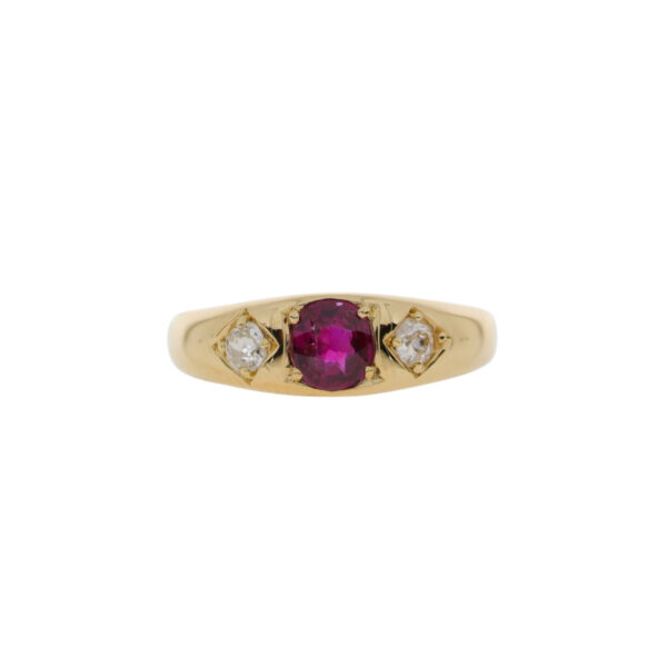 Ruby and diamond three stone ring, 18ct yellow gold gypsy setting