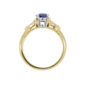 Z112.4 Sapphire single stone ring tapered baguette diamond sides top