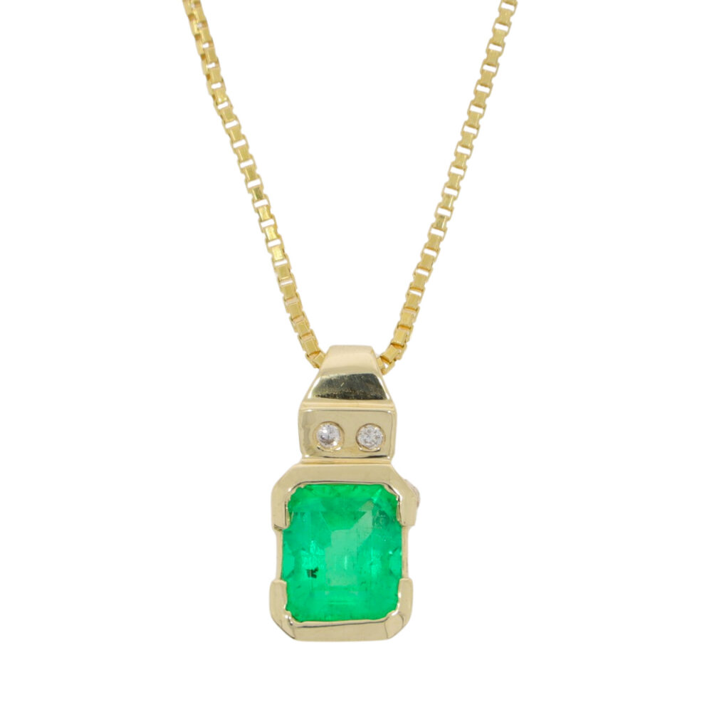 Emerald and twin diamond pendant, 14k yellow gold mount on 18k yellow gold necklace