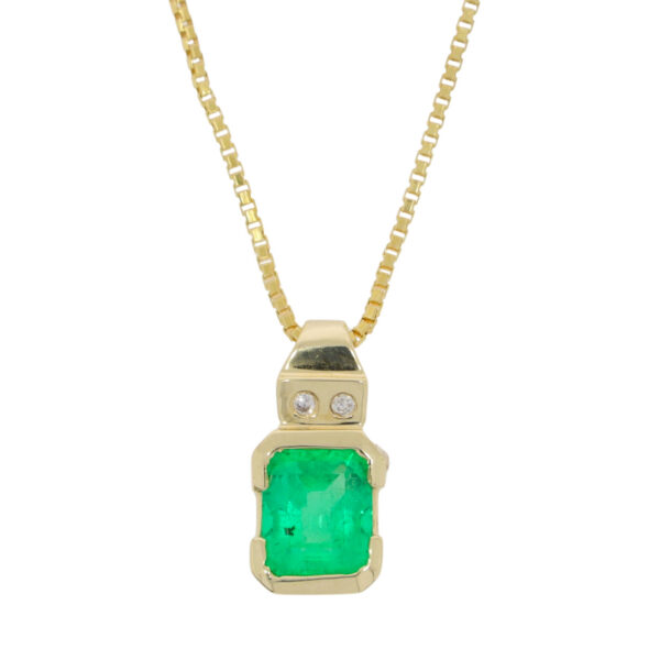 Emerald and twin diamond pendant, 14k yellow gold mount on 18k yellow gold necklace