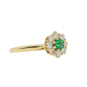 P130.4 Emerald and diamond cluster ring side