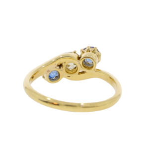 T113.4 Sapphire and diamond 3 stone crossover ring back