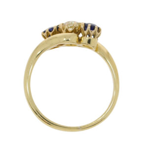 T113.4 Sapphire and diamond 3 stone crossover ring top