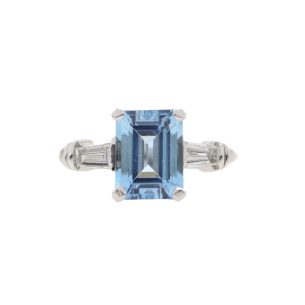 Aquamarine single stone ring with diamond tapered baguette cut shoulders, 18ct white gold mount
